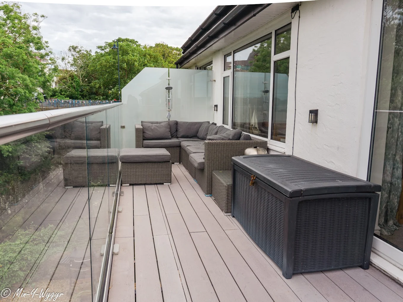 Outdoor seating on the raised balcony