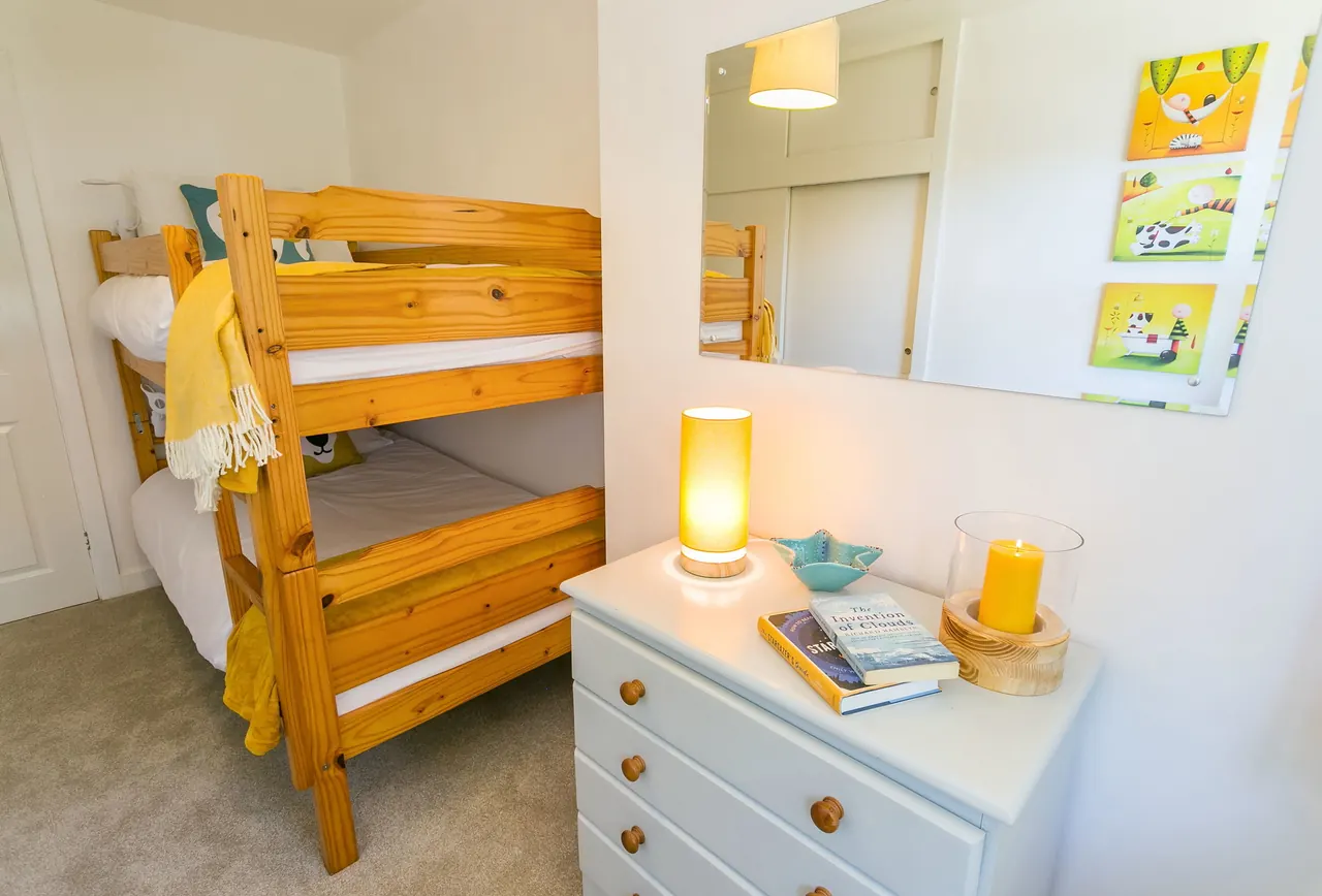 Bunk room with wooden bunk beds