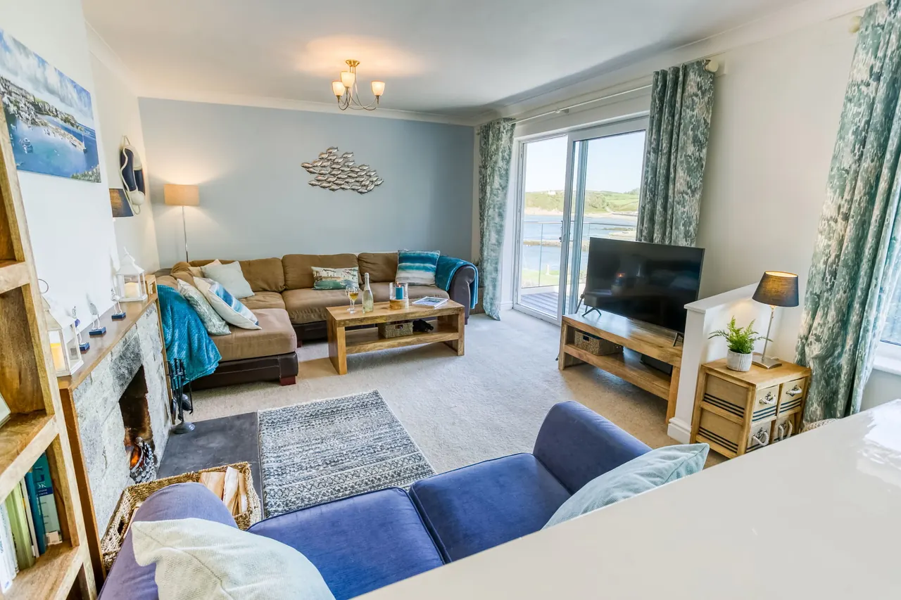 Lounge at Min-Y-Wygyr with sea views through large windows