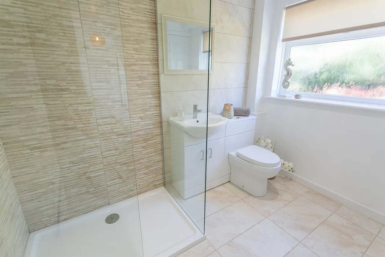 Bright shower room with glass shower screen